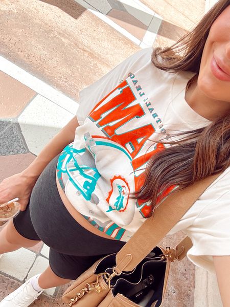 Wearing a medium men’s in this! Such a cute tee. Wearing a small in my favorite maternity biker shorts :) 

#LTKfindsunder100 #LTKfindsunder50 #LTKbump