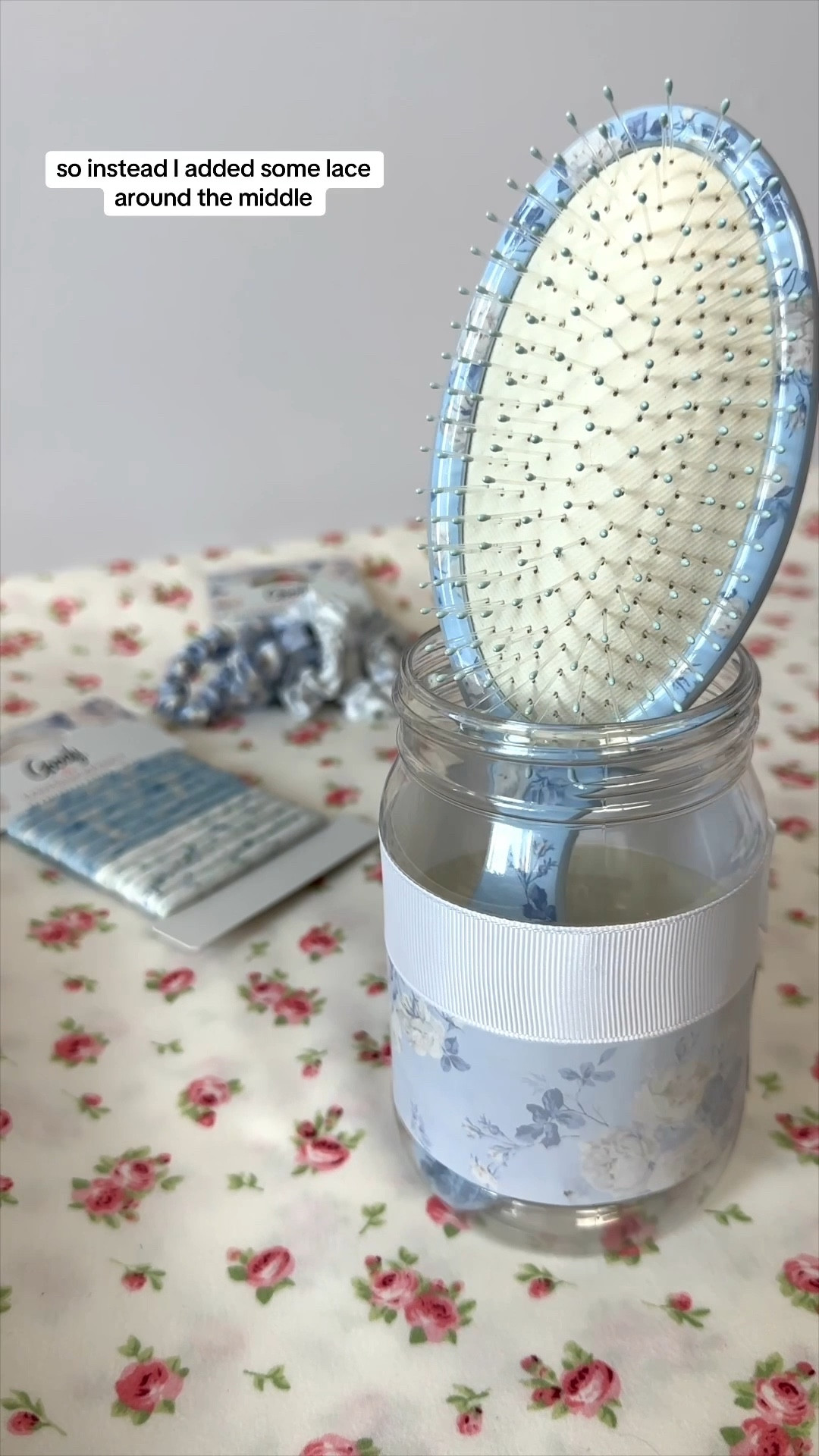 making a @loveshackfancy hairbrush + hair tie / scrunchie holder using packaging from the @thewetbrush + @goodyhair collab 💙🎀🫶🏻

I didn’t have any more body scrub containers, so I used a @peanutbutterco jar so it can hold the hair brush too! 

#diy #loveshackfancy #loveshackfancyhaul #wetbrush #hairtutorial #vanityorganization #hairhack #hairhacks #upcycling 

#LTKSeasonal #LTKBeauty #LTKWatchNow