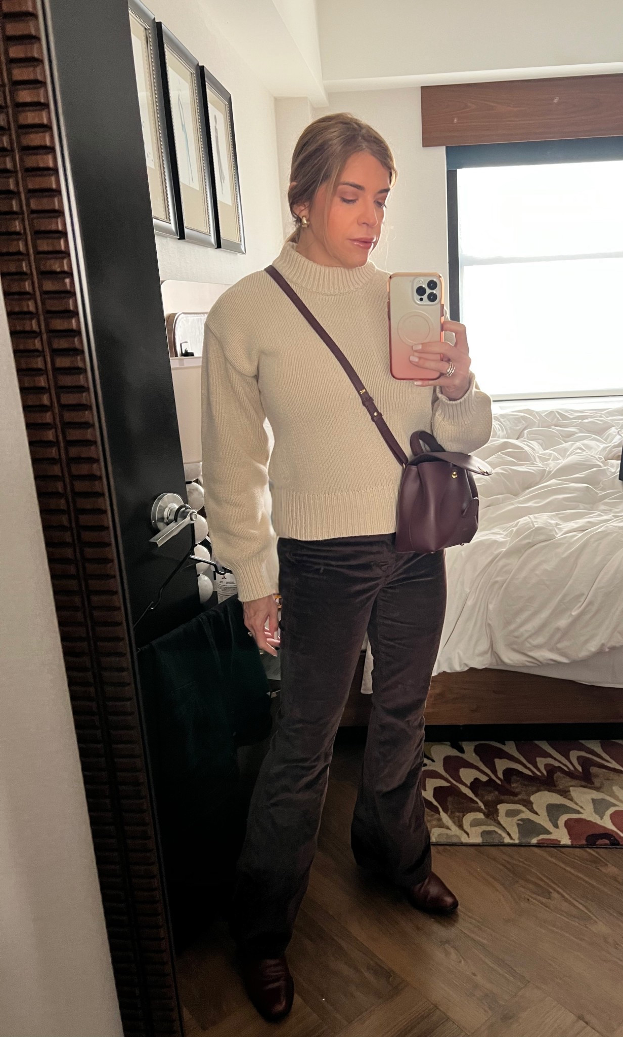 When the photographer husband is working, you gotta work with what you’ve got! 
Loved this cream turtleneck paired with chocolate cords, and a burgundy mini bag to stroll around the city. Spring palettes can also be neutral - especially when is still cold outside. 
Click to shop this dreamy outfit. 

#LTKSeasonal #LTKootd #LTKdayinmylife
