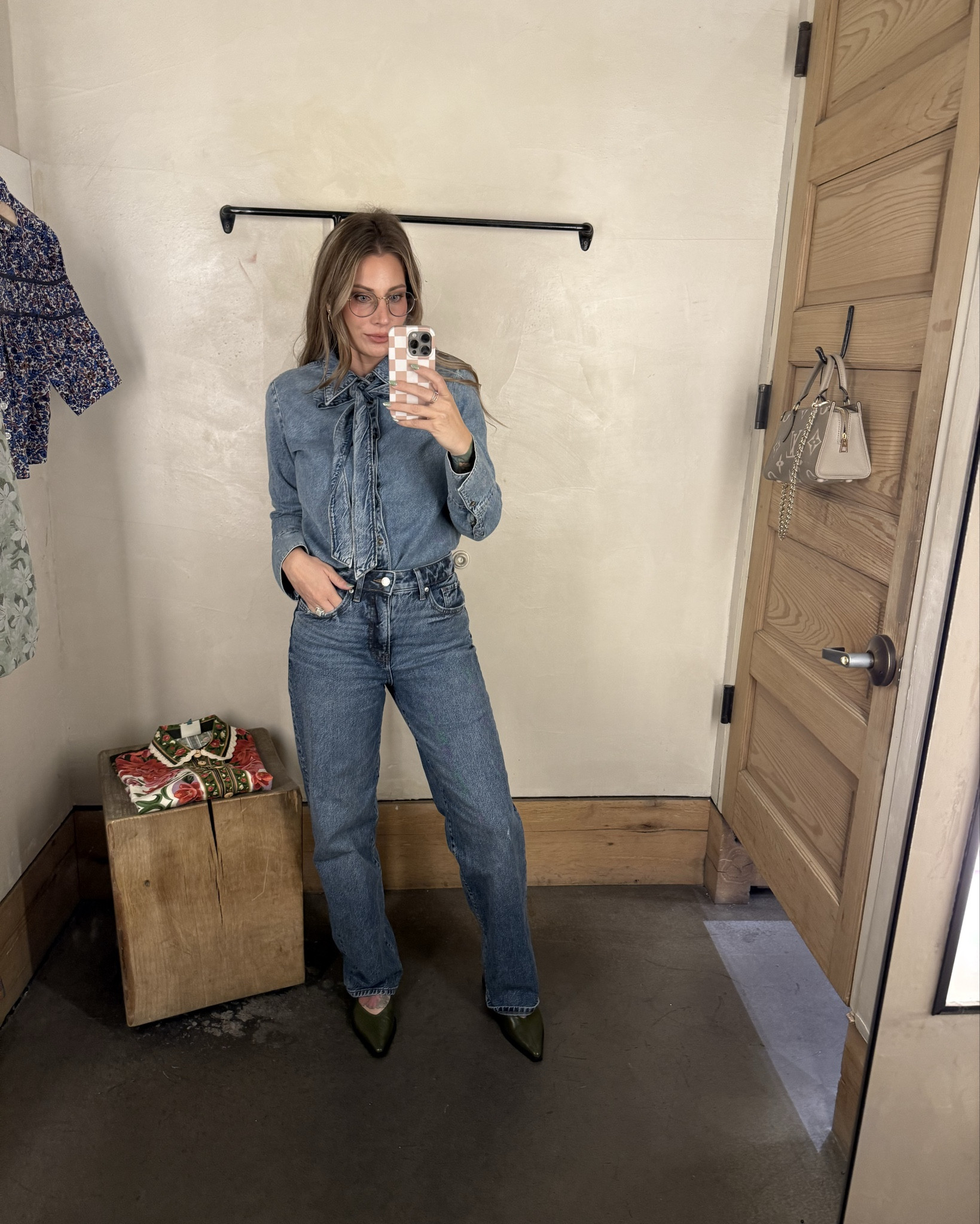 I love when I’m able to find classic pieces that have unique detail to them. Like this classic button down top with this bold pattern, or this denim top with a fun bow, they are fun and unique. 
Denim blouse runs small - I’m in a medium 
Jeans 4R 
Button down size S
Dress size S (the dress that I have linked as the exact dress is a different pattern, but it is the same exact dress and silhouette)

#LTKHoliday