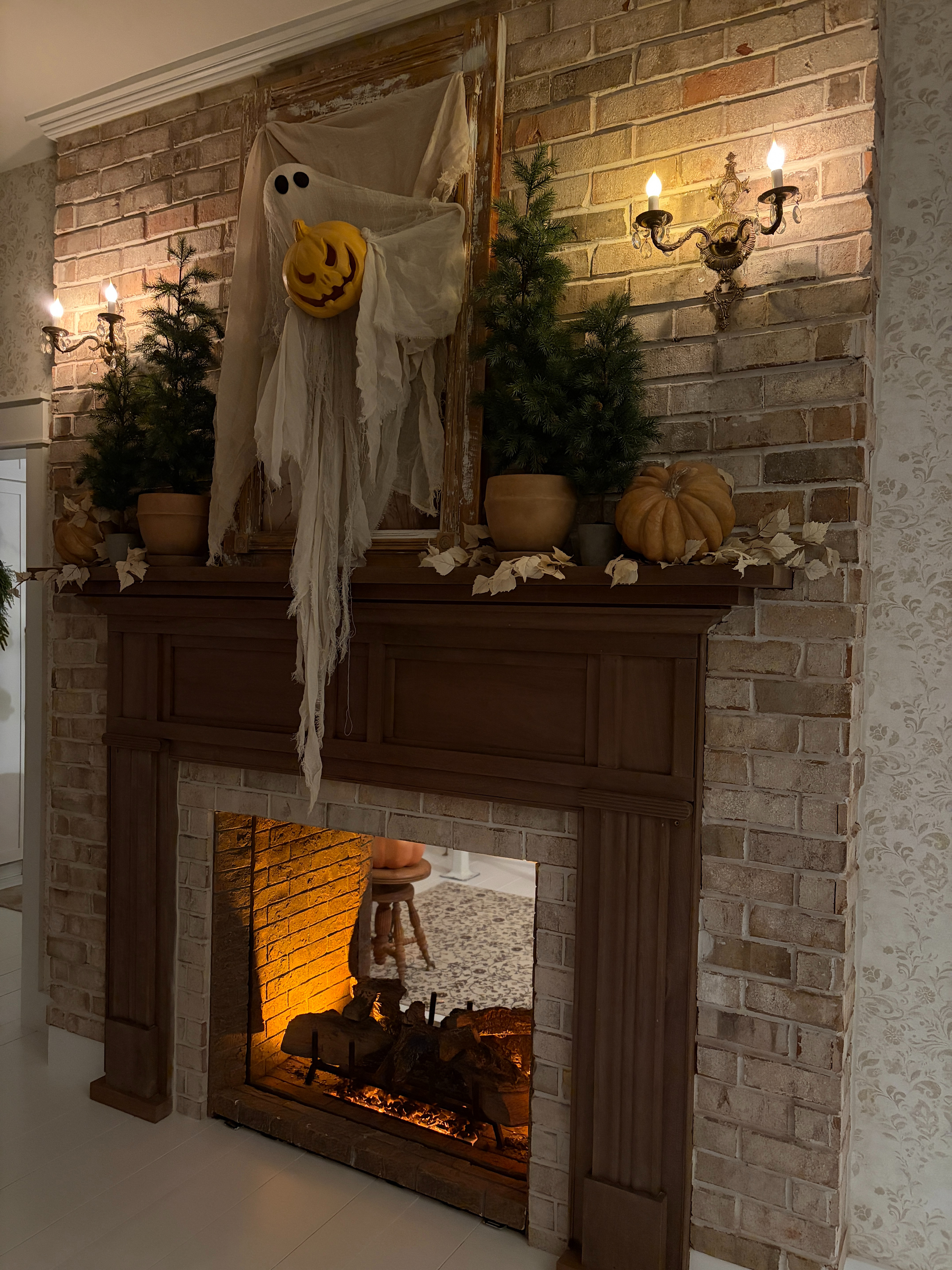 I added this ghost and pumpkin to a vintage frame, and I love the neutral Halloween look above our dining room mantel.  

 #LTKSeasonal #LTKHome