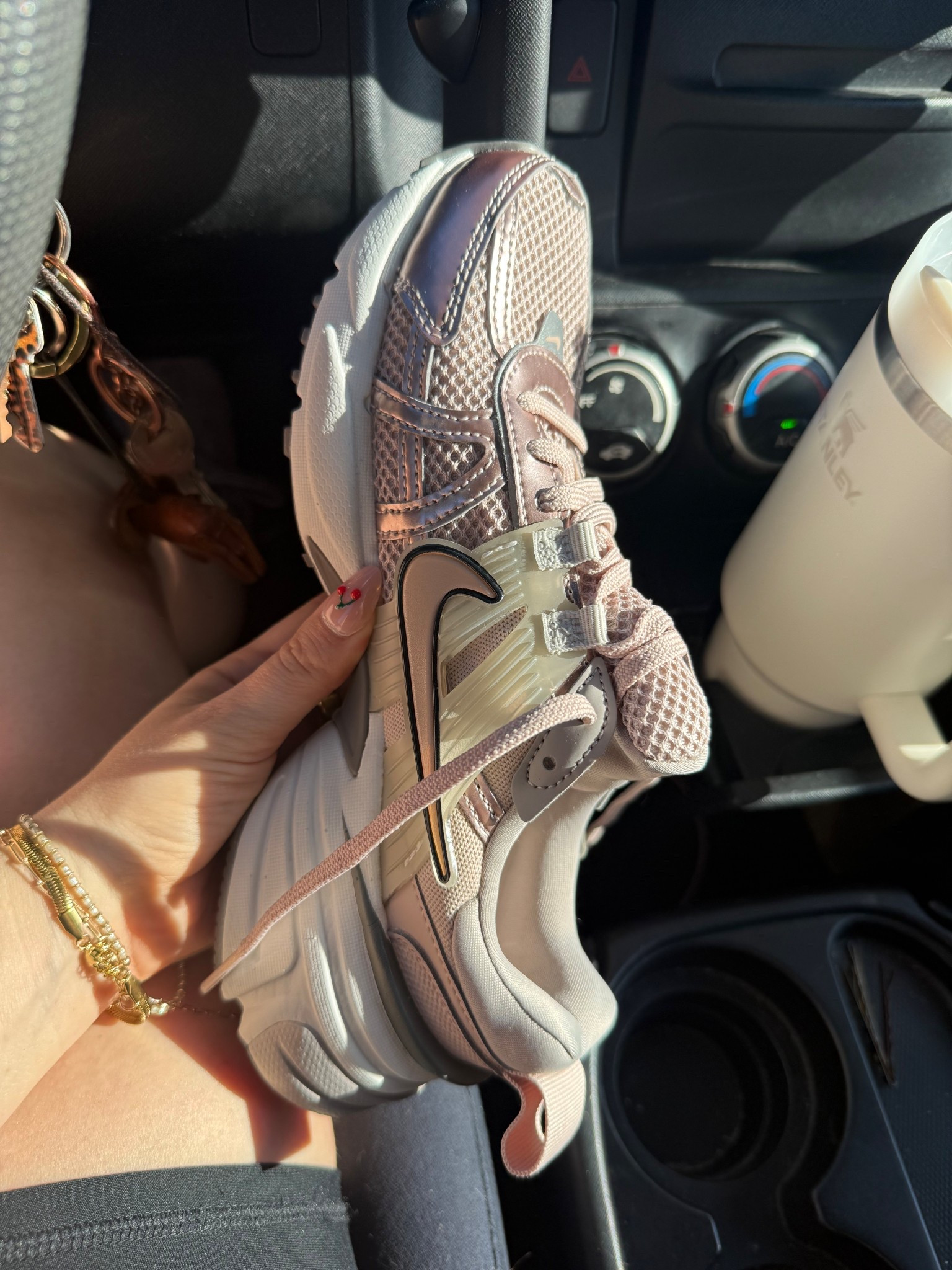 cute athletic sneakers - a taupe rose gold kind of color. Very pretty but still neutral. Under $75! Nikes. Run TTS  

#LTKShoeCrush #LTKFindsUnder100 #LTKSaleAlert