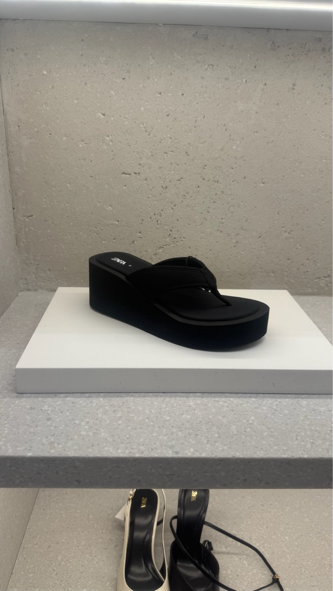 Wedge platform flip flop find! Comes in all black and a white color block option.

#LTKootd