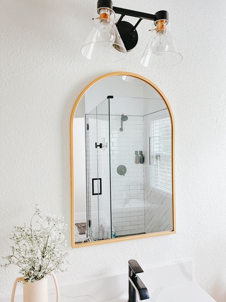 Arch brass gold mirror, bathroom vanity mirror, arch bedroom mirror,
Modern bathroom remodel, matte black bathroom hardware, bathroom lighting

#LTKhome #LTKfindsunder100 #LTKMostLoved