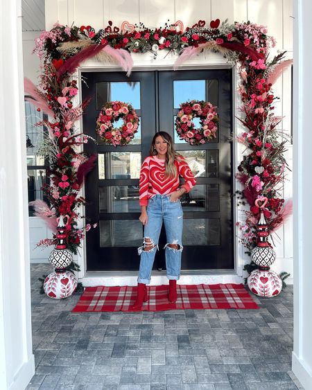 In a medium heart sweater, size 28 agolde jeans and red booties for Valentine’s Day from Amazon - all fits TTS.

#LTKunder50 #LTKstyletip #LTKSeasonal