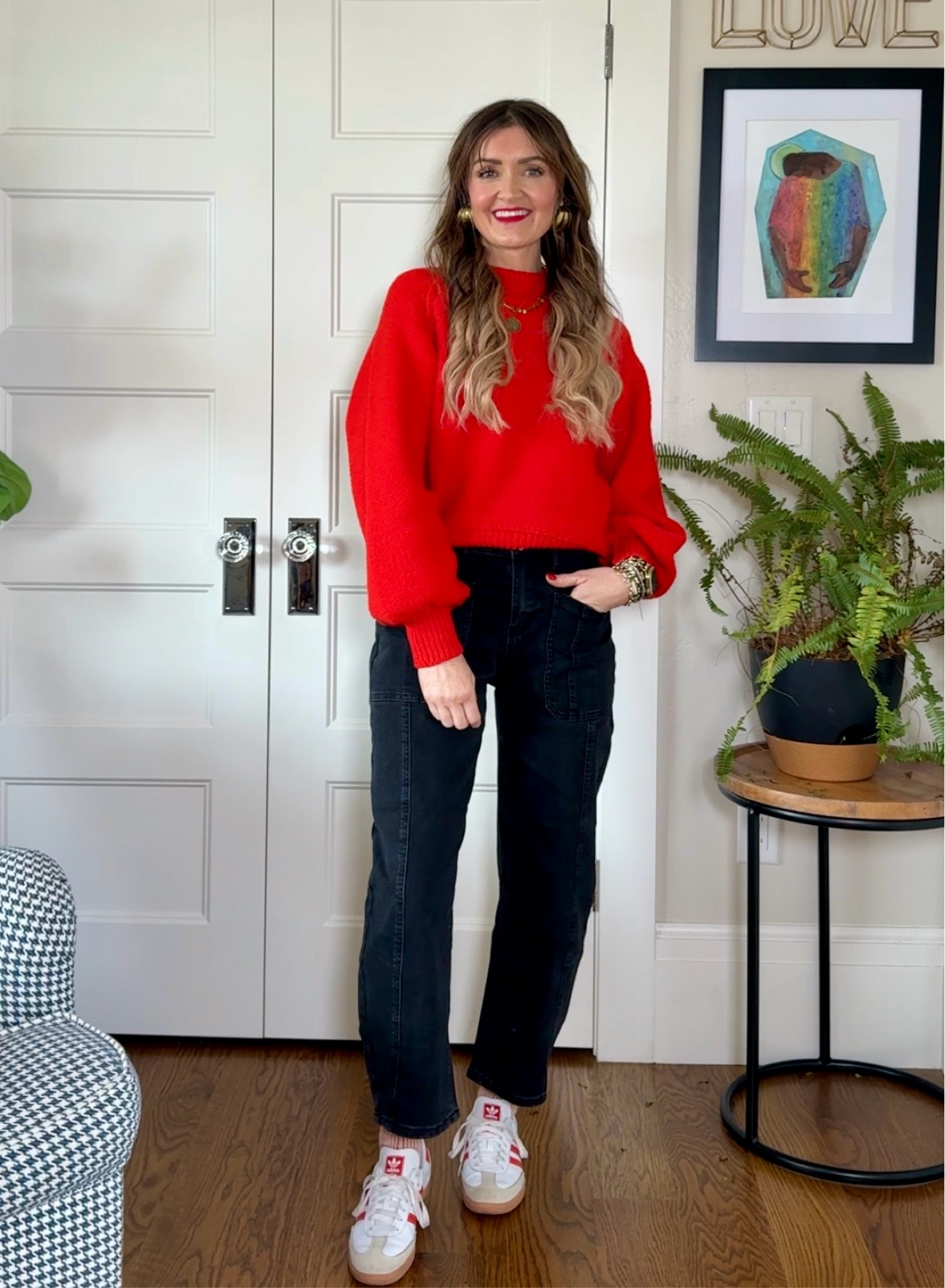 A bright tomato red sweater, black barrel jeans, and sneakers with great red accents make for an outfit that perfectly mixes polished and sporty!

#LTKStyleTip #LTKOver40 #LTKShoeCrush