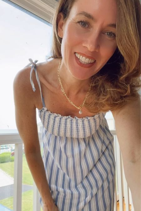 Blue and White Striped dress with smocked top and midi skirt #hm #summerdressses 

#LTKMidsize #LTKSaleAlert #LTKOver40