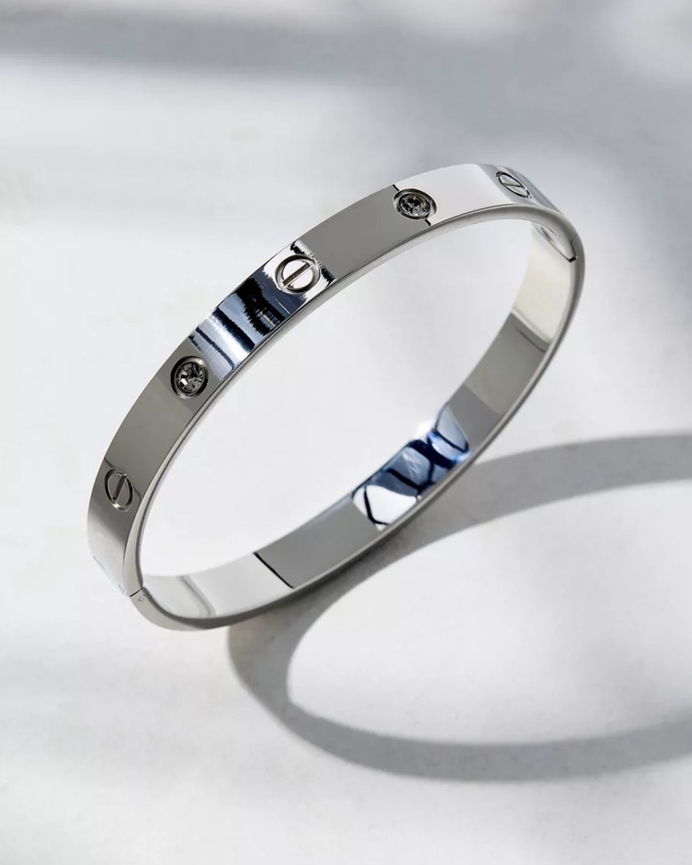 Silver Cartier inspired jewelry from Urban Outfitters