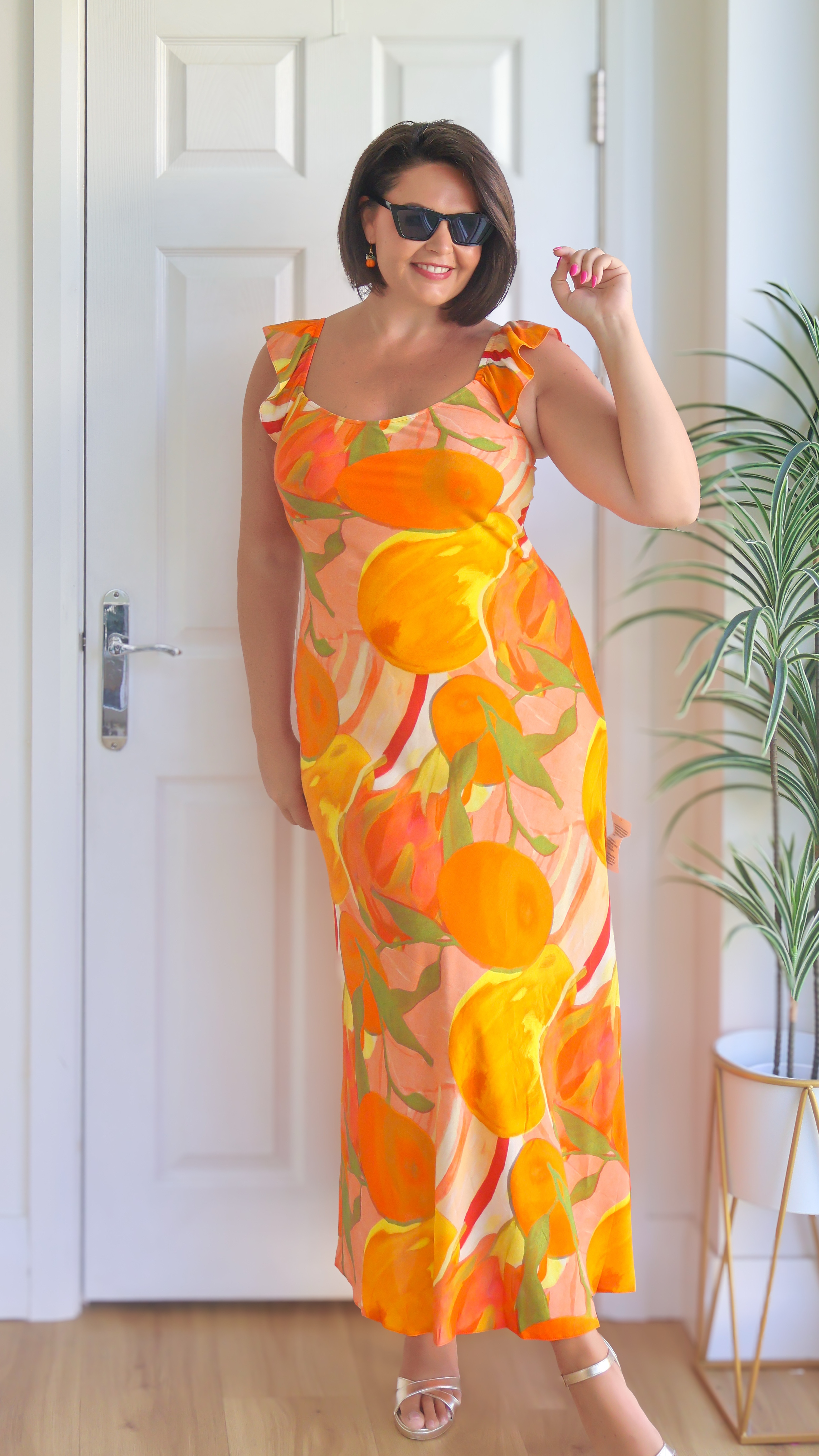 I’m a little obsessed with fruit print at the moment, I see it and have to have it! I don’t normally purchase from ASOS but I couldn’t resist this orange print fun happy print.  Lovely and lightweight and great shape for my midsize body too. 

#LTKuk #LTKmidsize #LTKsummer