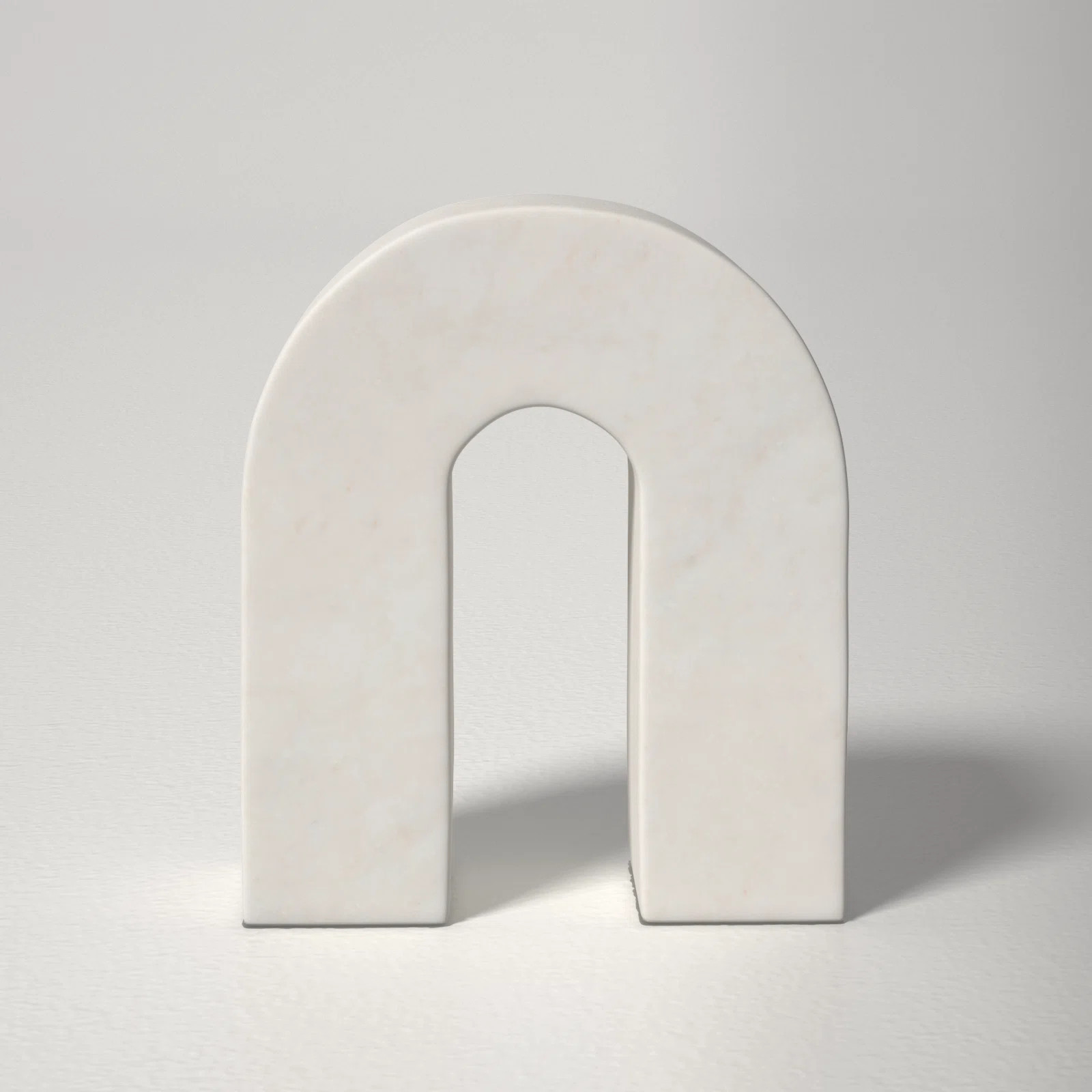 Modern Neutral Marble Horseshoe Tabletop Decorative Object | Wayfair North America