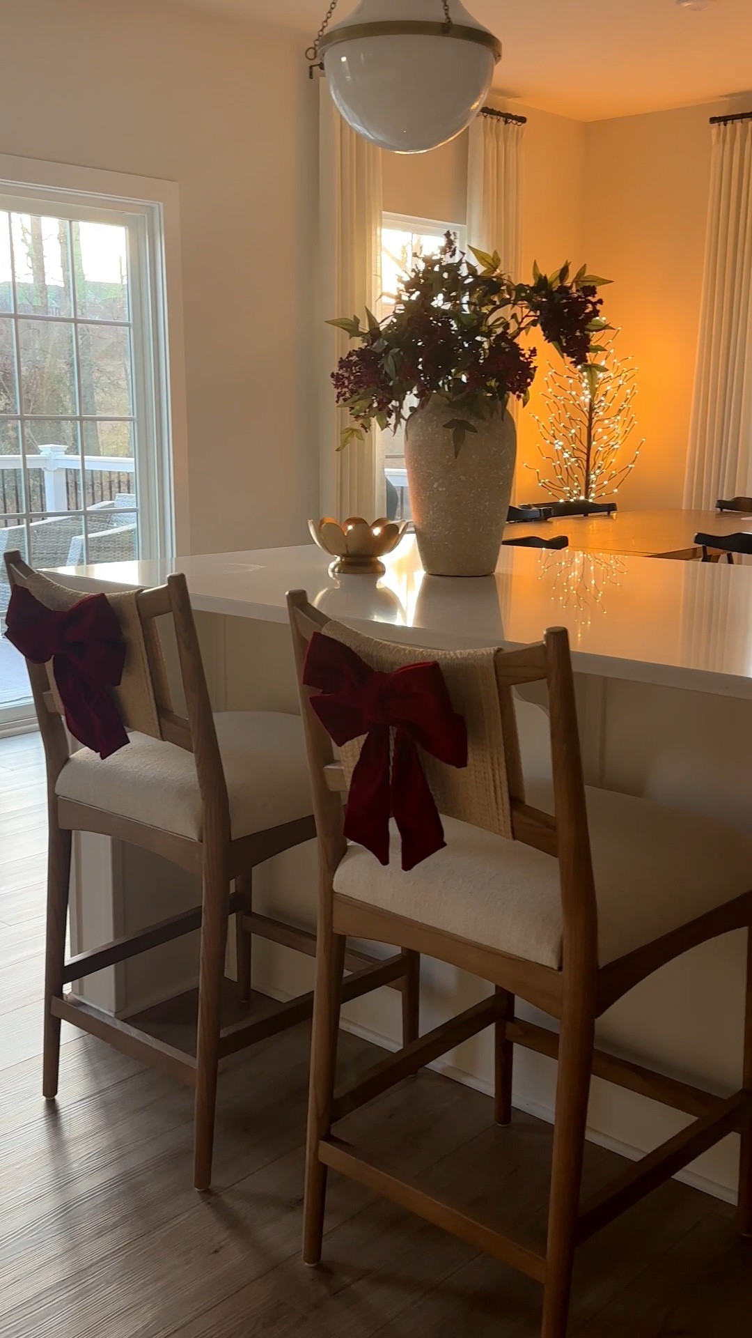 Love these burgundy bows on the back of our kitchen counter stools. 
#bows #christmasbows #burgundybows #kitchencounterstools #holidaydecor #kitchendecor 

#LTKHome #LTKSeasonal #LTKHoliday