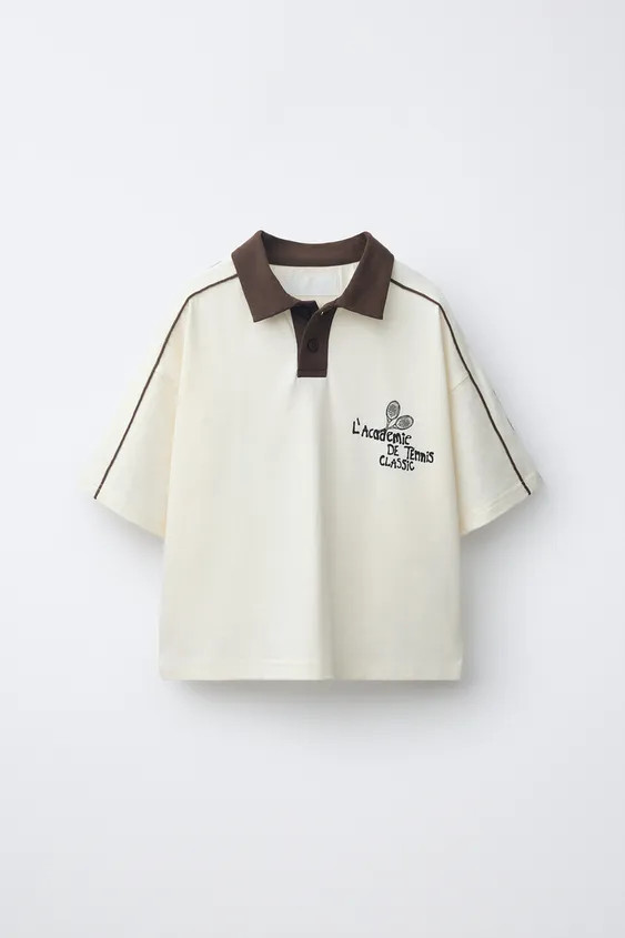 Polo shirt with collar and short sleeves. Contrast piping detail at shoulders. Tennis print at ch... | Zara US