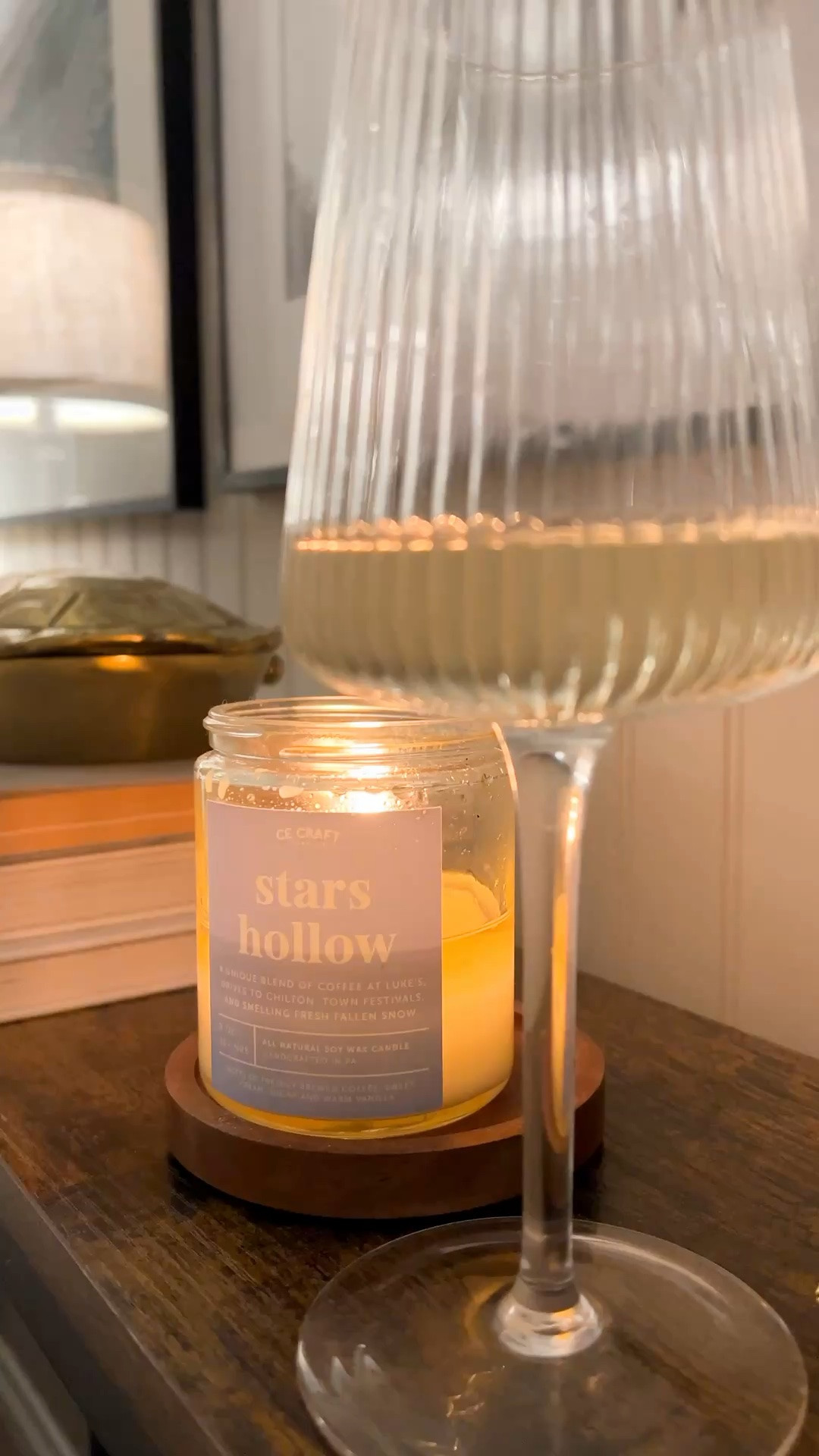 I smell FALL 🍁 Be ready for the first crispy fall night with this Stars Hollow coffee scented candle! Some Sauvy B in a pretty wine glass helps, too!

#LTKmomlife #LTKSeasonal #LTKHome