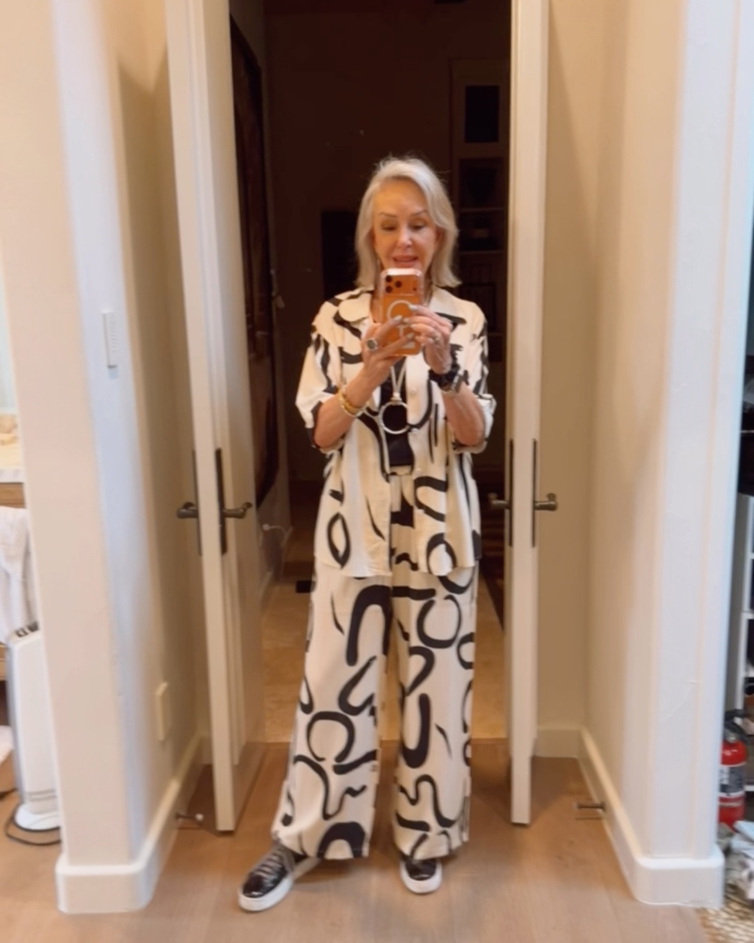 Womens Summer Print 2 Piece Sets Pajama Style. Short Sleeve Button Down Outfit Long Pants. Wear out and about or for a Sleepwear Set
Great for travel and vacation 
Worn over a black tank top
Platform black sneakers 
Chico’s pendant necklace makes it so chic

#LTKTravel #LTKootd #LTKOver40