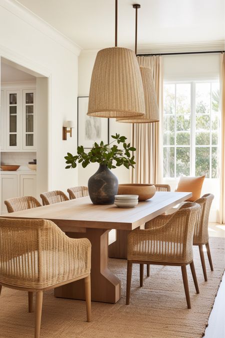 Casual off the kitchen dining space with lots of coastal inspiration - woven pendants & chairs. White oak dining table & jute rug  

#LTKfindsunder100 #LTKfindsunder50 #LTKhome