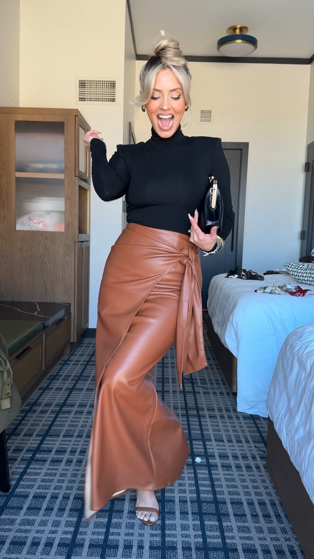 Day 2 snappy casual but slay 😆😍

Obsessed with this skirt! Under $100 and has the perfect amount of stretch. Wearing size XS! 

Exact turtleneck is so old buttttt get yourself the linked turtleneck + add the shoulder pad inserts 😮‍💨 for a more structured elegant look! 

#LTKCon #LTKStyleTip #LTKPetite