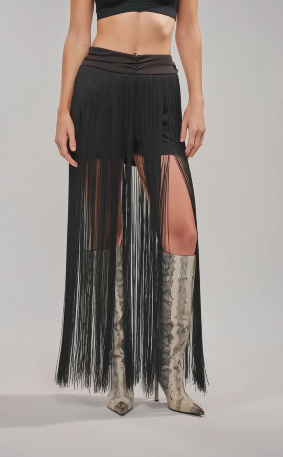 ON THE EDGE FRINGE SKIRT IN BLACK | AKIRA