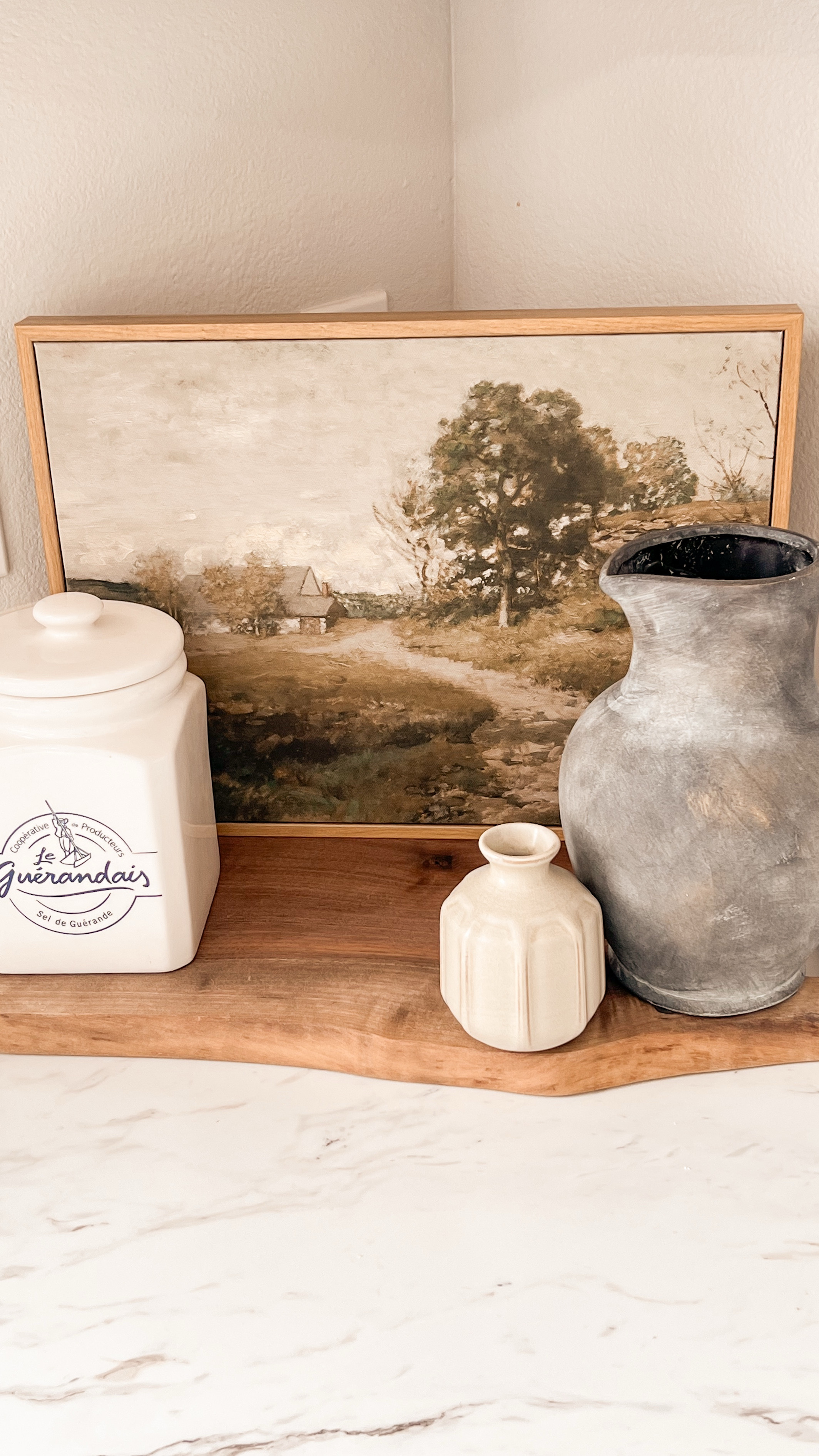 A simple little corner that adds just the right touch of warmth. This kitchen vignette features sculptural vases, soft ceramics, and a warm wooden base: easy layers that feel organic, cozy, and collected. Perfect for everyday styling, and even better in a space that’s still evolving.

kitchen vignette decor • neutral kitchen styling • organic modern home • warm kitchen accessories • amazon kitchen decor • ceramic kitchen vases • traditional kitchen style • home decor layering • kitchen counter styling ideas • classic kitchen details • cozy corner styling


#LTKFindsUnder50 #LTKWatchNow #LTKHome