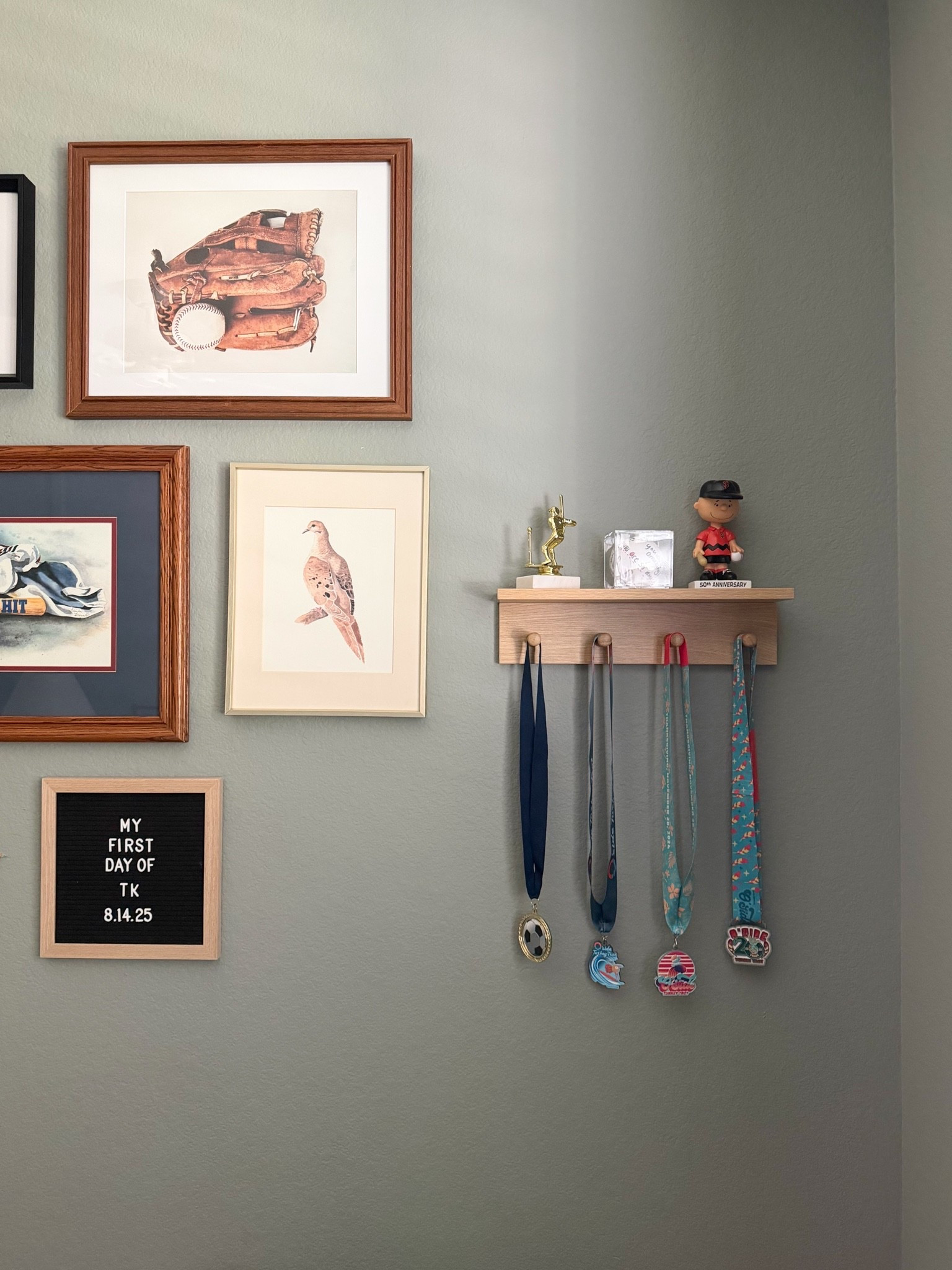 Boys room gallery wall ideas

How to display sports medals and trophies

Wooden shelf with pegs
Letterboard

#LTKHome #LTKKids