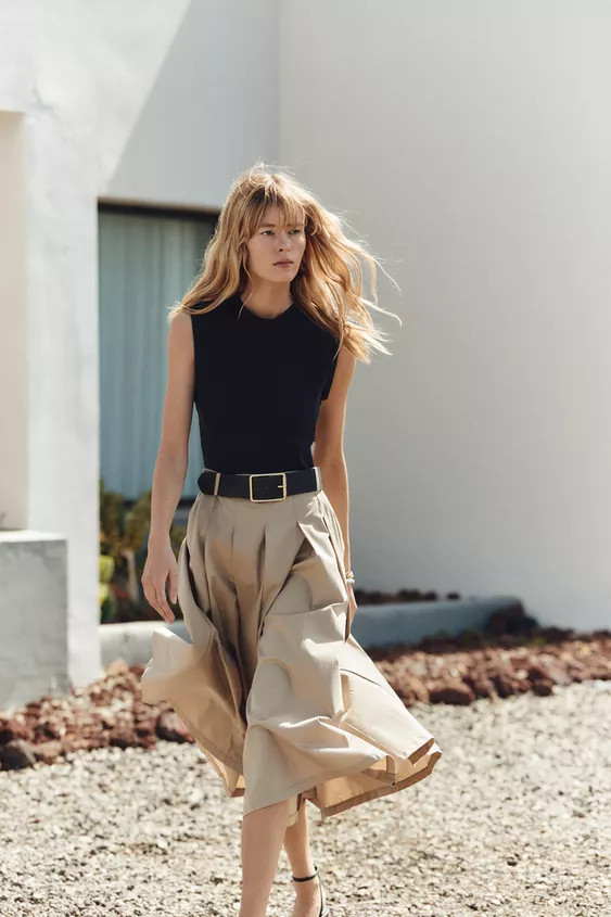 Dress with combined bodice and skirt. Round neck and sleeveless with shoulder pads. Belt detail a... | Zara US