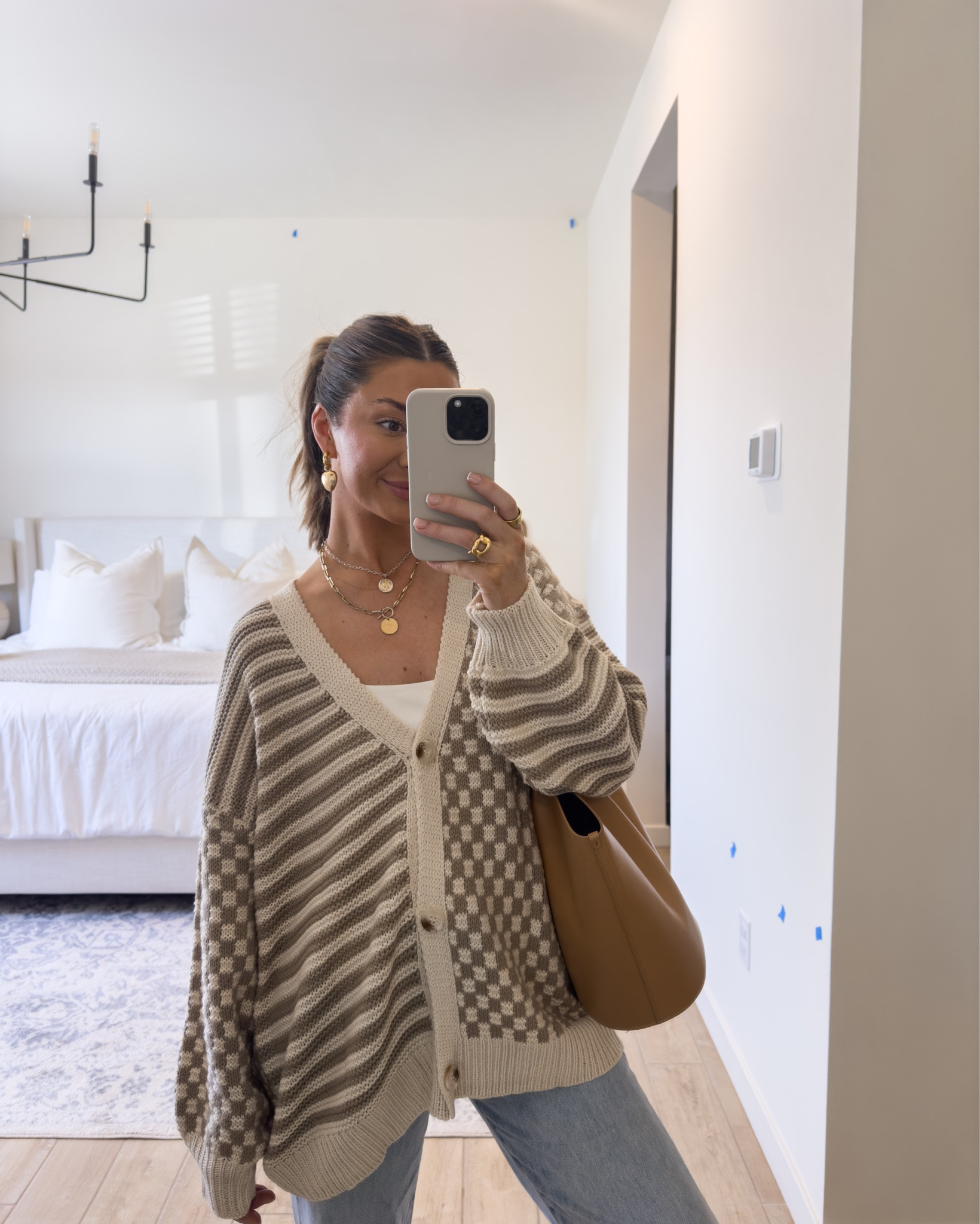 NICOLEC for 30% off this checkered cardigan under $50! Wearing a medium! 27 in jeans 

#LTKFindsUnder50 #LTKSaleAlert