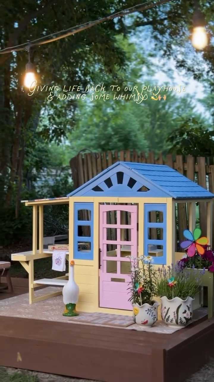 The playhouse makeover!!!! 💛🩷🩵 This playhouse has been so loved the last 4 years but it was time for a little love and refresh! Ollie picked the blue roof and Evelyn requested pink, so we landed on this and it is almost identical to the one I grew up with! 🥹💫 Feels so much happier back here and they’ve been playing nonstop. The yellow is “Vanilla Ice Cream” by @behrpaint 💛 @kidkrafttoys #playhousemakeover #whimsicalplayhouse