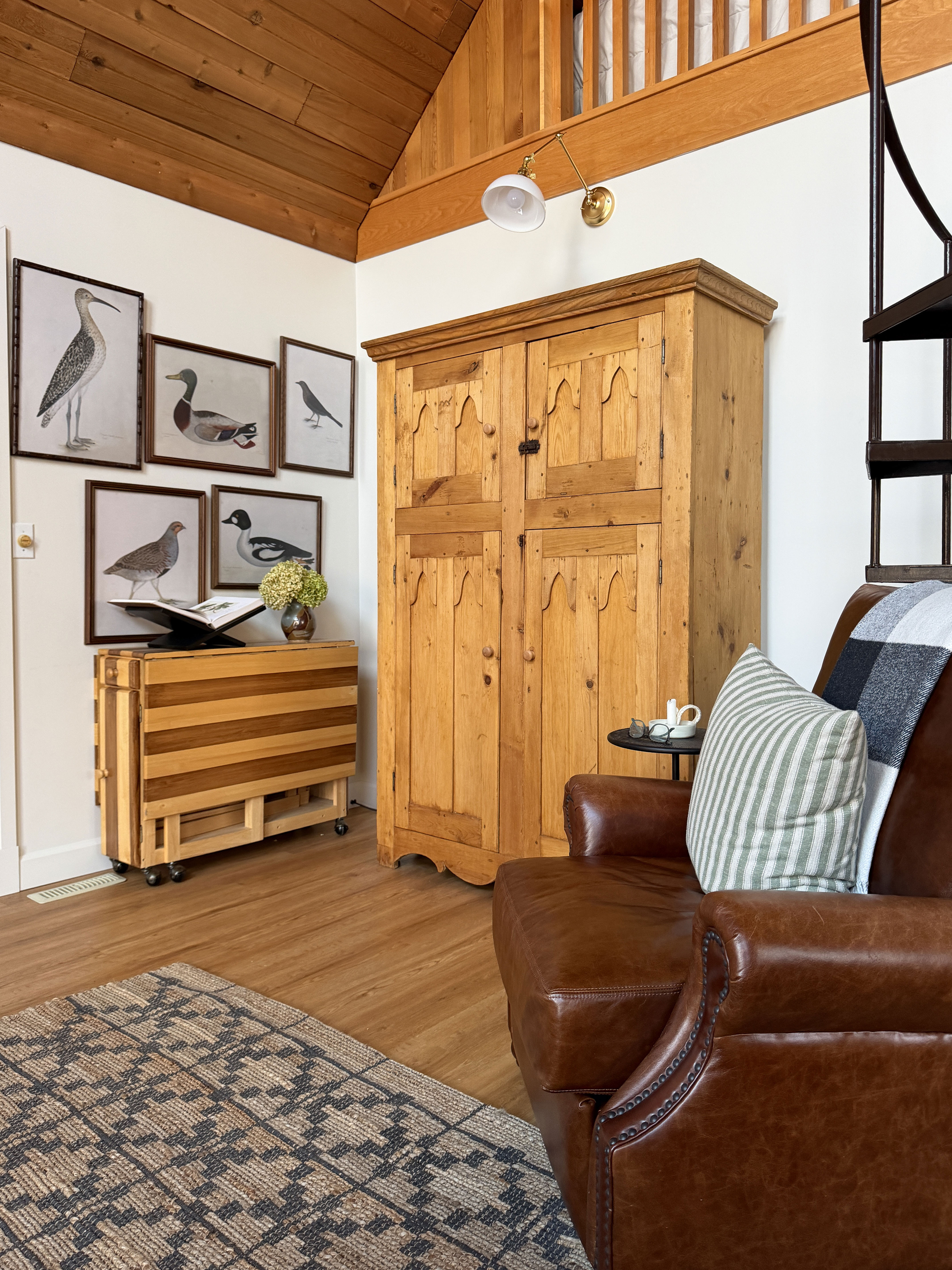 Cozy Cottage Living Room

Rug, Sconce, leather chair, pillows, accessories 

 #LTKHome
