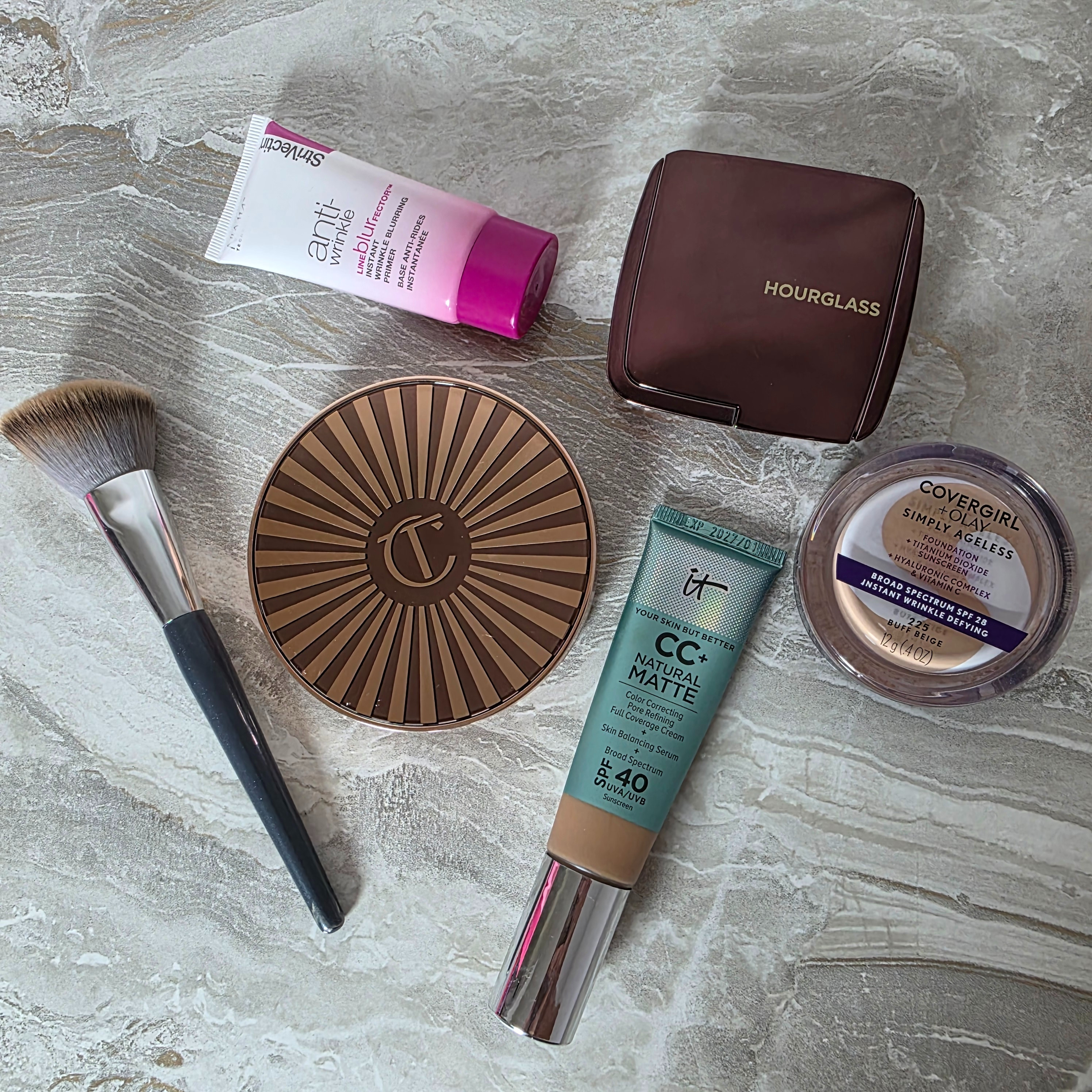 
Everything laying out my current base makeup routine for mature skin — and there are some surprises in here. The IT Cosmetics CC+ Natural Matte is blurring pores without sitting in fine lines. The CoverGirl Simply Ageless is a drugstore WIN. And the StriVectin Line Blur? Primer that actually does something. Full breakdown linked. #ad #makeupover40 #matureskinmakeup #foundationover40 #ITcosmetics #CCcream #Hourglass #CoverGirlSimplyAgeless #StriVectin #antiagingmakeup #drugstoremakeup 

 #LTKgrwm #LTKOver40 #LTKBeauty