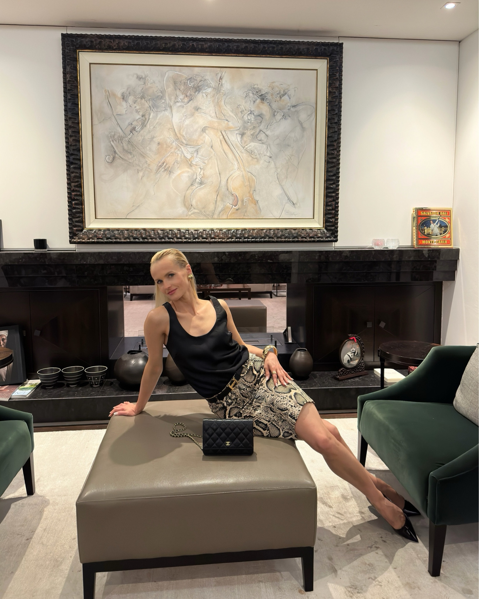 Evening minimalistic classic 

Minimal chic summer evening- dinner look with a bit of sophistication.

Wearing Wolf & Badger gold round large studs, Kenneth Jay Lane gold chunky bangle, Zara camisole black top and python knee length pencil skirt, Hermès constance reversible belt, Chanel caviar black leather wallet on chain , YSL patent black pointy toe flats.

#LTKstyletip #LTKuk #LTKsummer