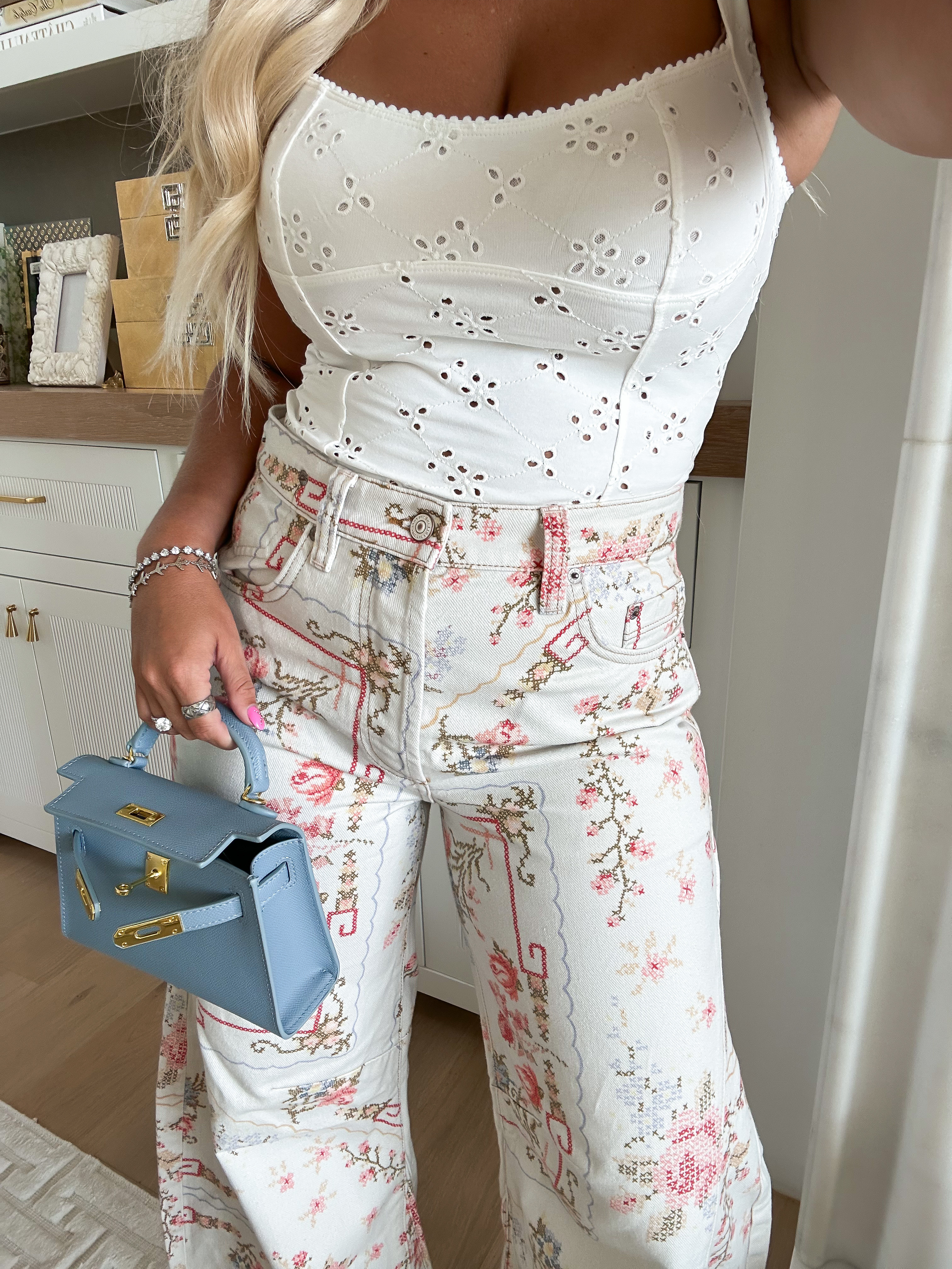 Free People try on haul floral denim pants / wearing size small top and 27 SHORT jeans - they do run small  

#LTKFindsUnder100 #LTKSeasonal #LTKStyleTip