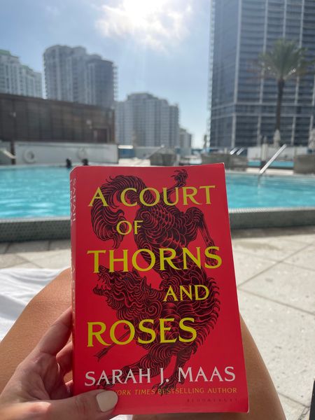 Currently reading: A Court of Thorns and Roses. 

Beach read. Book. Vacation book  

#LTKfindsunder100 #LTKfindsunder50
