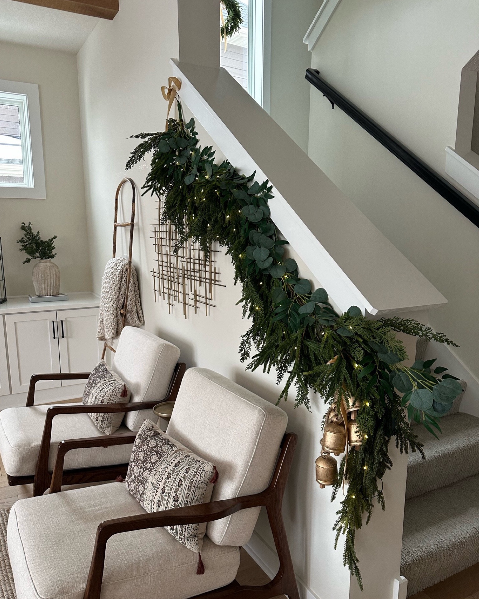 Christmas garland restocked! You can use code TAYMBROWN20 for 20% off the garland and wreath. Linking the exact bells and ribbon I used as well! 

#LTKHoliday #LTKSeasonal #LTKHolidaySale