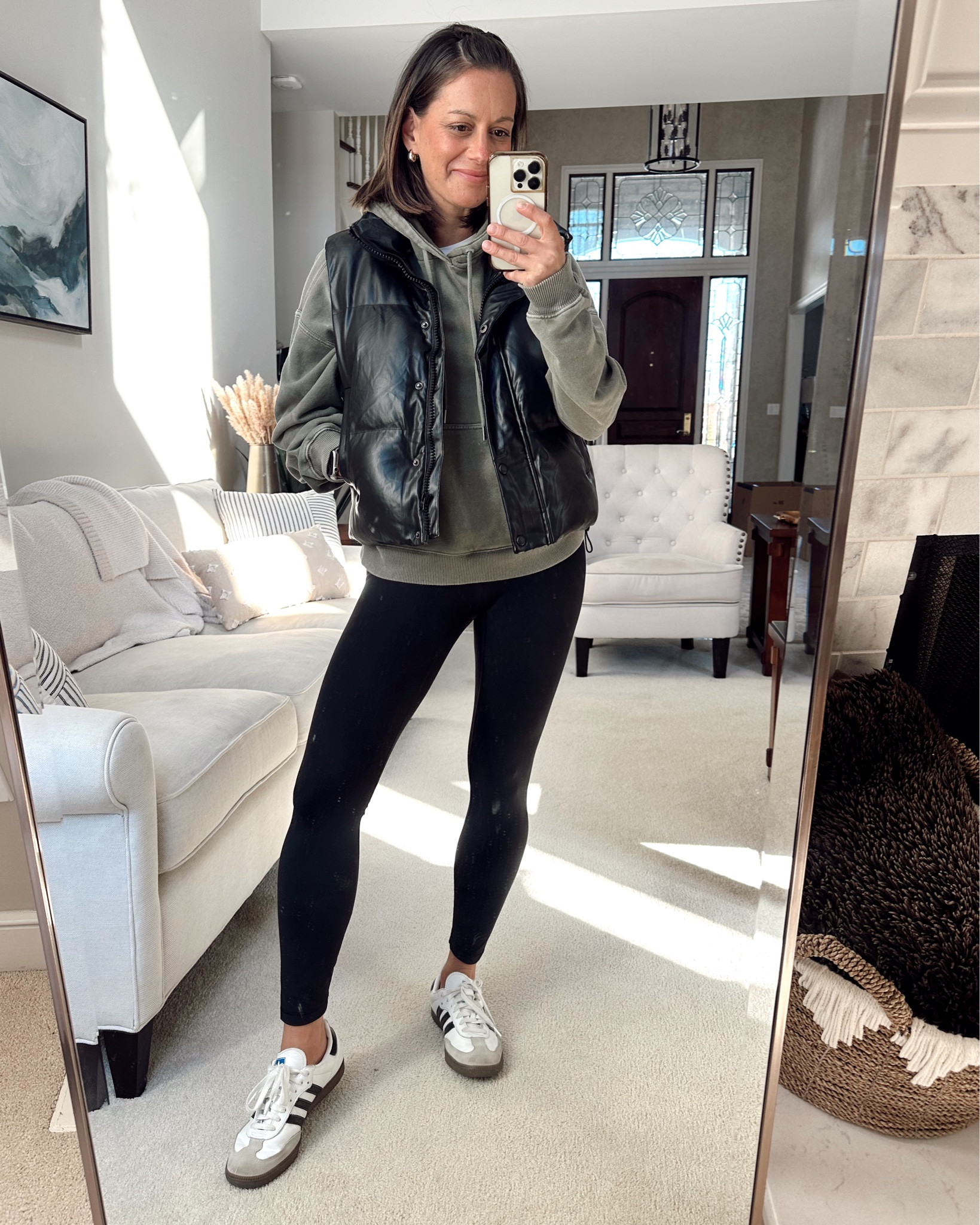 Winter outfit of the day! ❄️ 
Aerie hoodie (runs tts - wearing a small), no front seam leggings (tts), leather puffer vest (tts), samba (tts to big)



#LTKOver40 #LTKFindsUnder50 #LTKStyleTip