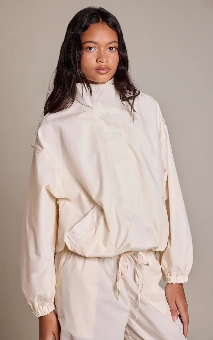 Cream Nylon Funnel Neck Oversized Jacket | PrettyLittleThing UK