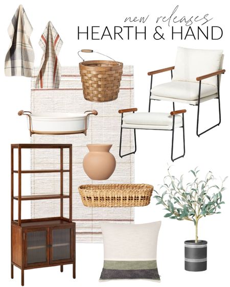 Check out these new releases from Magnolia Hearth and Hand and Target!! Items include a wood and glass baker rack, a faux olive tree, a wood and metal accent chair and ottoman, a cream and brown striped rug, a color block pillow, a set of plaid kitchen towels, a woven harvest basket, a round ceramic vase, a stoneware oval baking dish and a woven bread basket. 

target fall, fall home décor, fall décor, simple decor, coastal decorating, beach style, targetfanatic, targetdoesitagain, targetiseverything, hearth and hand, target home finds, target furniture, target area rugs, magnolia home, magnolia, target home, hearth and hand new release, target under 50, decorative vase, decorative pillows, target threshold, target is my favorite, fabric ottoman, target furniture, target pillows, hearth and home target, target finds, target rug, target home, living room decor, living room decor, coastal design, coastal inspiration #ltkfamily #LTKRefresh 

#LTKSeasonal #LTKstyletip #LTKunder50 #LTKunder100 #LTKhome #LTKsalealert #LTKunder100 #LTKstyletip #LTKsalealert