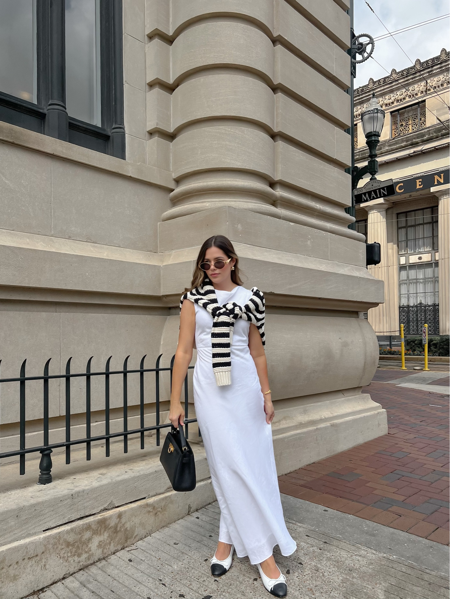 White linen maxi dress, chunky striped knit sweater, cap toe ballet flats

#LTKstyletip