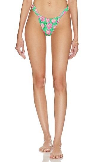 Ruched Thong Bikini Bottom in Melon Sorbet Print | Revolve Clothing (Global)