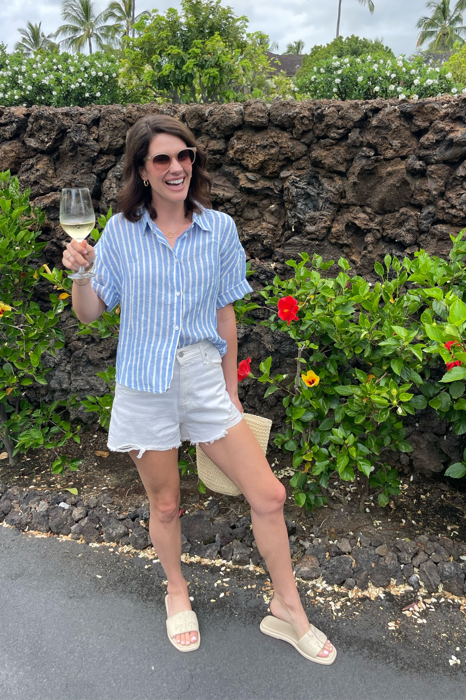 Another casual resort outfit. Heading to the spa and lunch! I’m wearing a small in the linen top. I rolled the sleeves. Some sizes are sold out so I tagged a few really cute similar options of blue stripes. // I always size up in Levi’s - I love these ribcage ones with the distressing. // These sandals are spendy but I wear them ALL the time and have had them for two seasons now. So comfortable. TTS or size up if between // Only two more days in Hawaii 😢 

#LTKTravel #LTKSeasonal