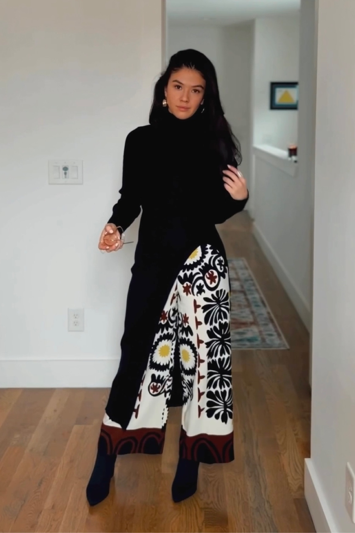 Black high slit sweater dress over fun pants 🖤✨

#LTKSeasonal #LTKStyleTip