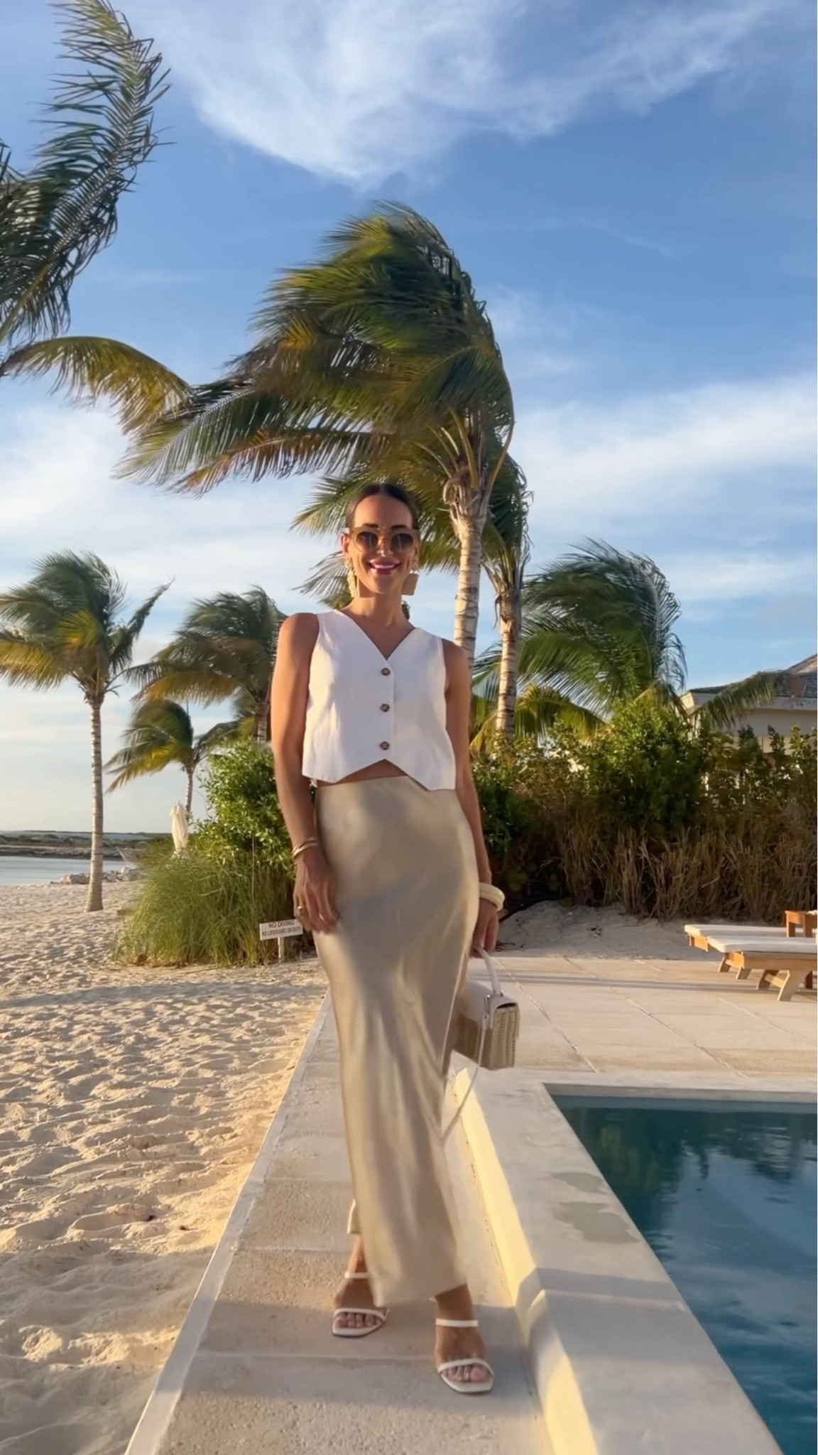 White vest with a silk maxi skirt - sexy, sophisticated, easy 

Skirt is 100% silk and machine washable!