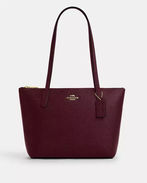 Fiona Zip Tote BagRating4.6£159COLOR: Im/Dark Wine12345Chevron Up IconAdd to BagADDING TO BAG...... | Coach (UK)