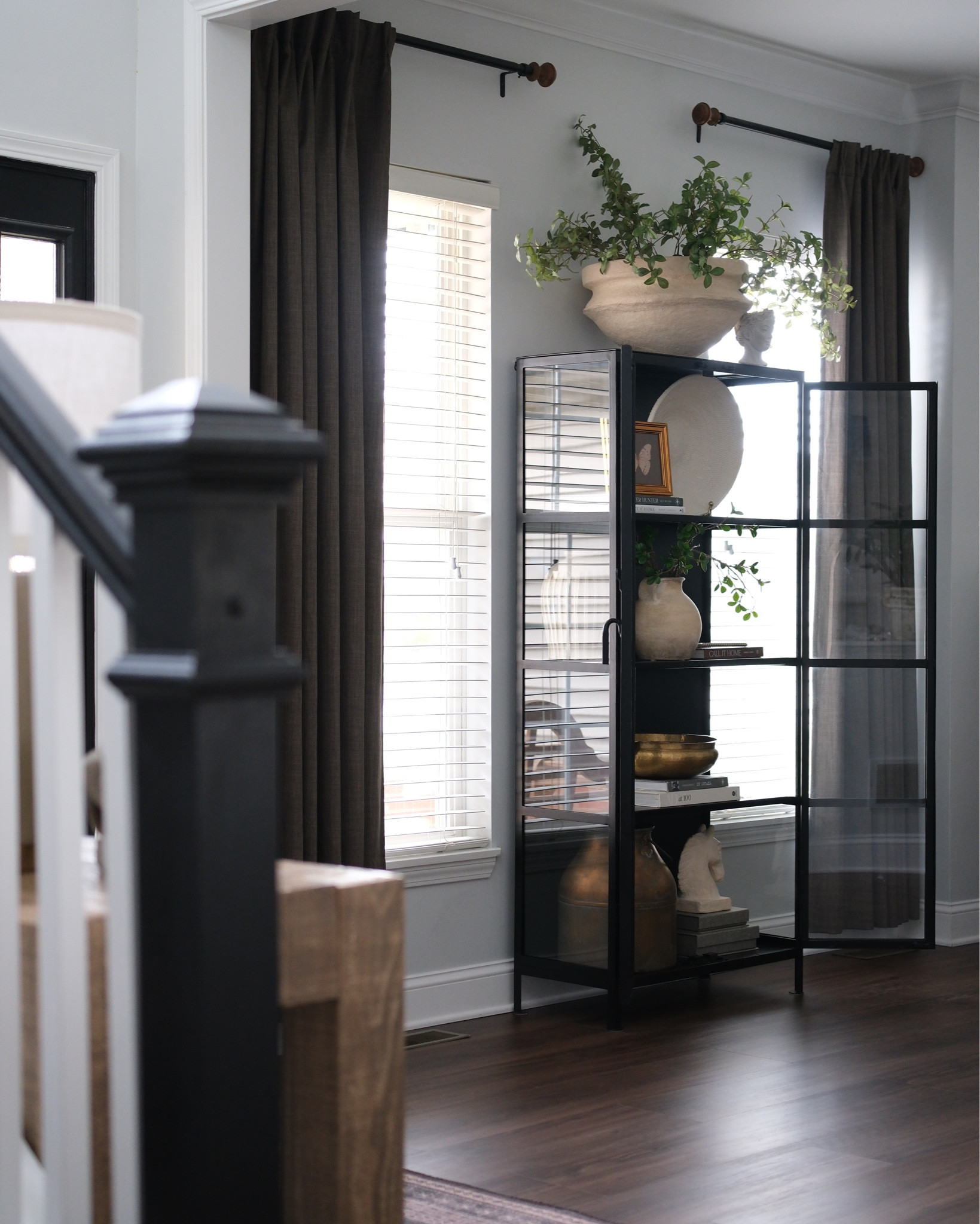 Glass cabinet restyling, added a vintage copper jug and some butterfly art. 

#LTKSaleAlert #LTKHome #LTKSeasonal