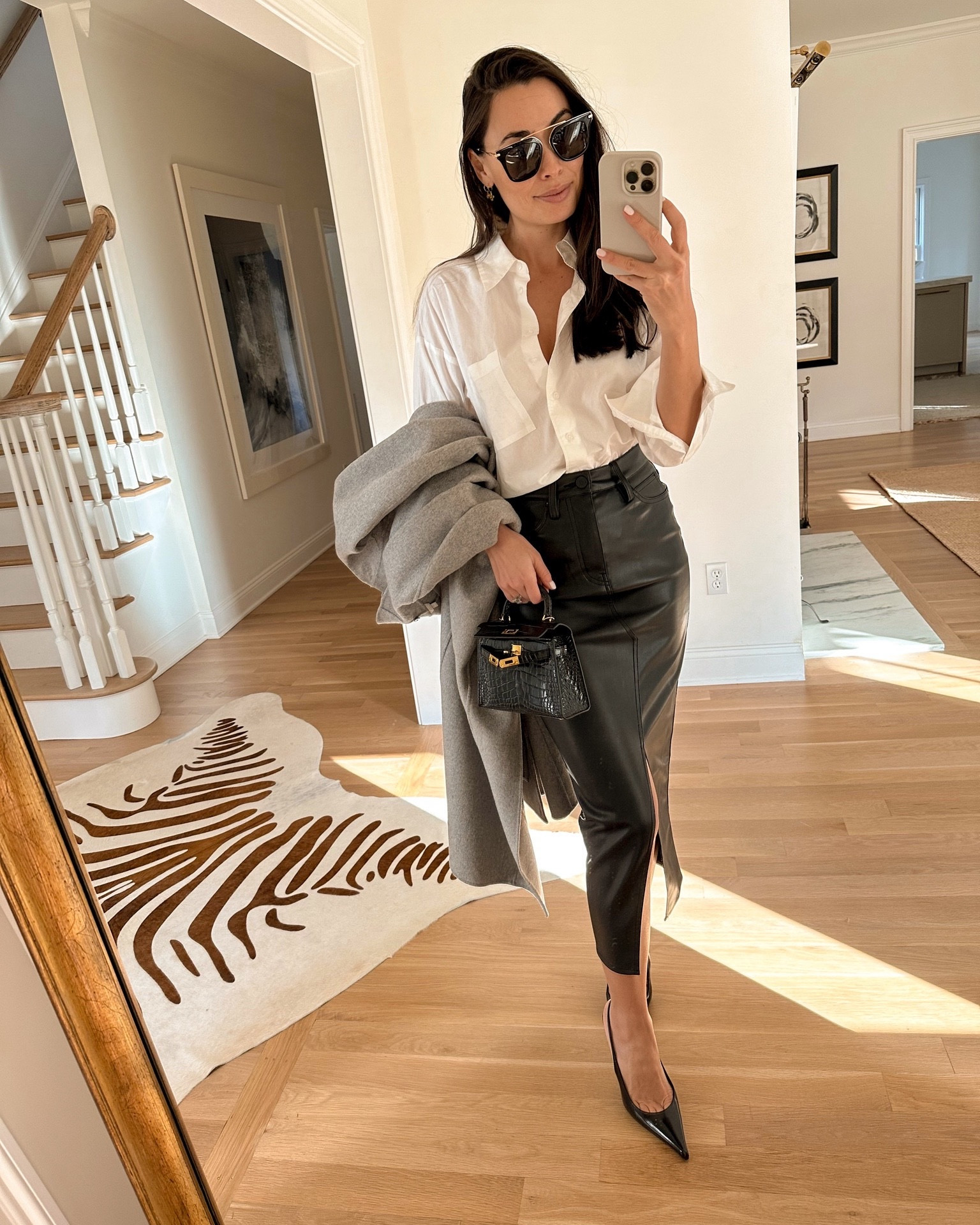 Leather skirt and button down, festive outfit, holiday. 

#LTKSeasonal #LTKHoliday #LTKWorkwear