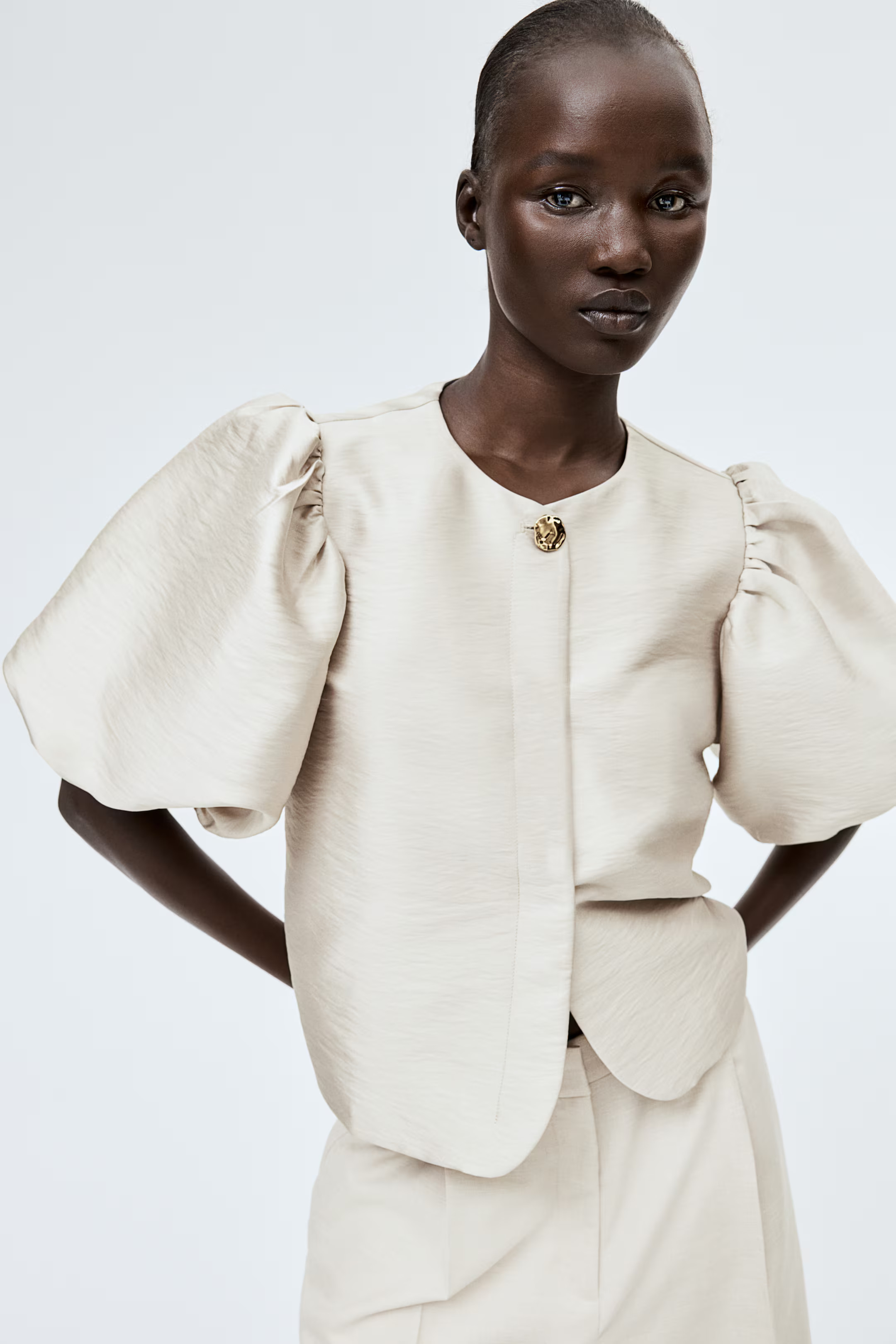 Blusa con mangas globo | H&M (FR, IT, ES, PT, BE)