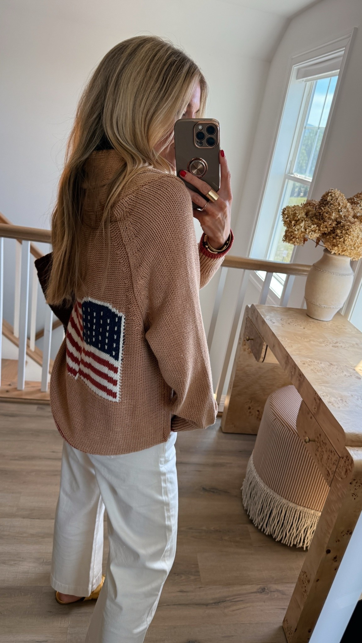 Love this cute American flag sweater for the Fourth of July! I have an exclusive Anthropologie 20% off code that works on my cardigan,Paige denim, and gold sandals- use code LEANNE20

#LTKootd #LTKgrwm #LTKSaleAlert