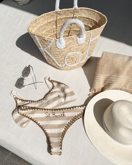 Kat Jamieson shares her St. Barth vacation essentials. Swimsuit, bikini, straw tote, sunglasses, beach hat and towel.

#LTKSeasonal #LTKswim #LTKtravel