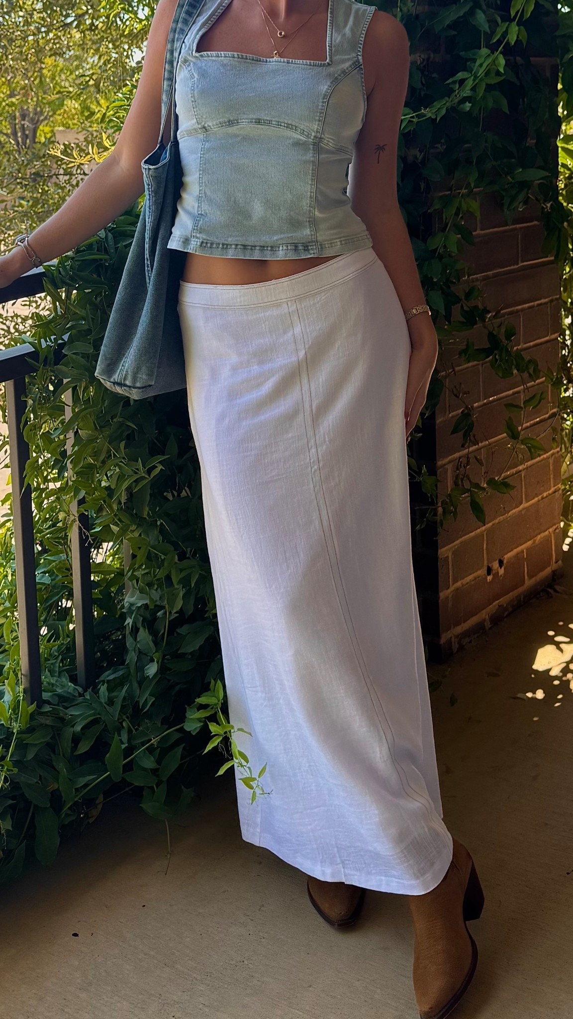 Weekend neutrals 💫 I’m obsessed with this soft denim tank — mine’s from last year and sadly out of stock, but I linked a super similar one from Amazon that gives the same vibe 🤍 Paired it with a flowy white maxi skirt and brown cowboy boots for a simple but put-together look! 

#LTKSaleAlert #LTKShoeCrush #LTKStyleTip