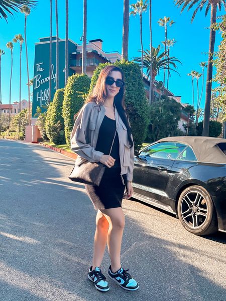 Bomber jacket
Black dress with bomber jacket
Nike dunk low
Celine sunglasses dupe 
