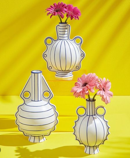Jonathan Adler
VENEZIA LARGE VASE

Inspired by handblown glass perfume bottles, our Venezia vases feature fantastical silhouettes made modern with bold cobalt accents. Available in three shapes and sizes, each crafted from matte white porcelain. Make a nouveau nautical statement with one or group all three for maximum glamour

#LTKBeauty #LTKGiftGuide #LTKHome