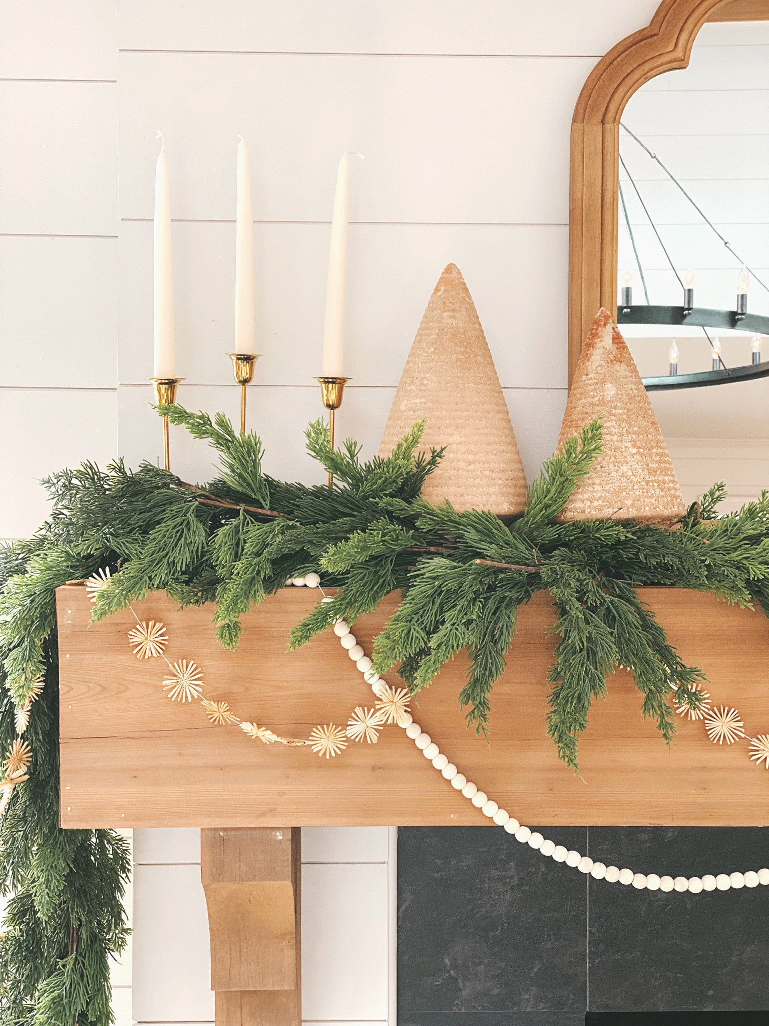 Holiday mantel, Christmas decor, stoneware trees, realistic garland, modern classic garland, candle sticks 

#LTKhome #LTKSeasonal #LTKHoliday